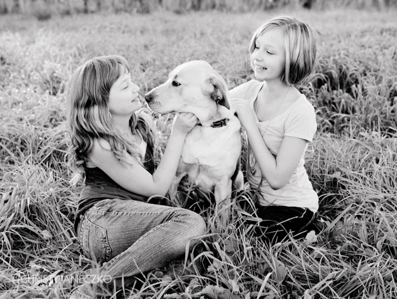 sisters with dog family portrait