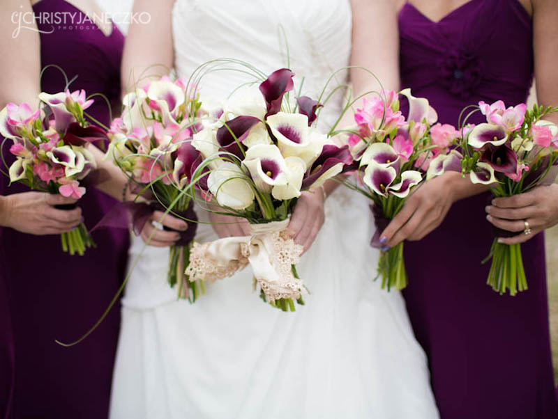 bridesmaid flowers with bride