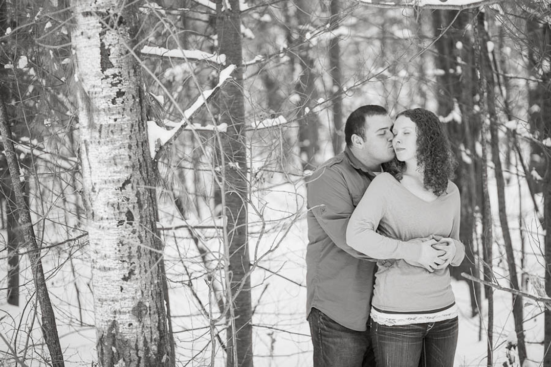 snowy engagement session in the woods bloomer wi
