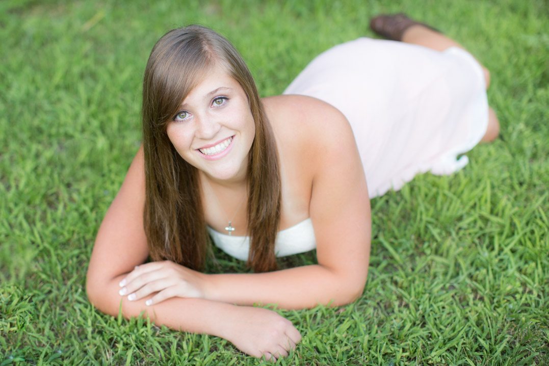 colfax wi high school senior pictures laying in grass