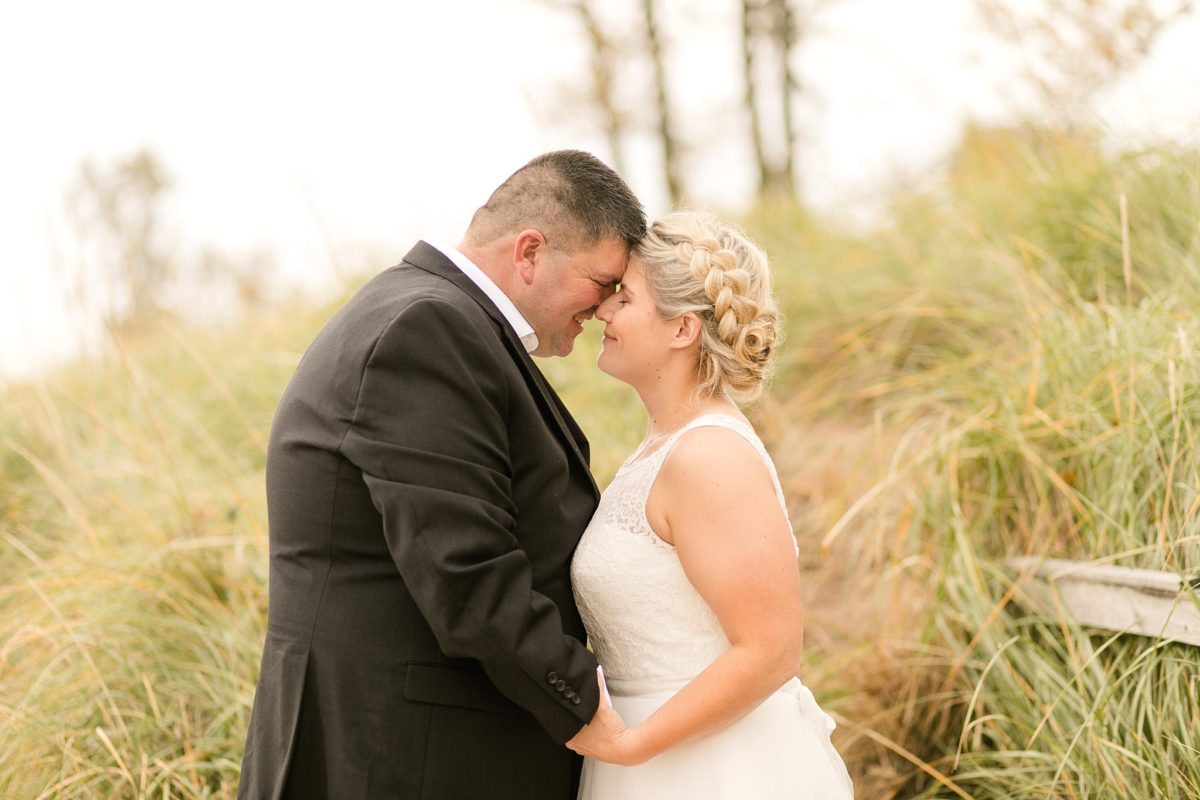 A calm October day on the North Shore proved perfection for Chrissy & George's Pier B Resort Duluth, MN wedding.