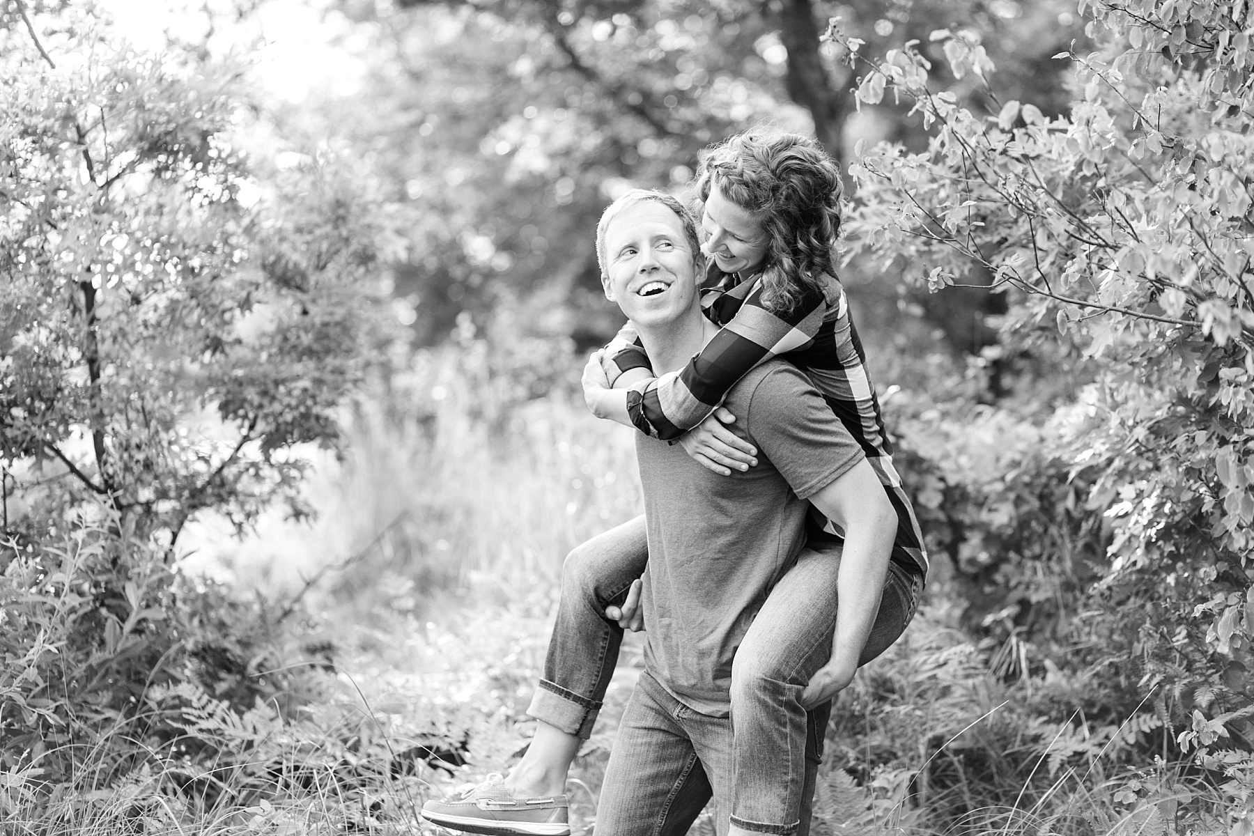 Just steps from the cabin where Susan spent so many summers, we photographed their engagement session on Lake Chicog.