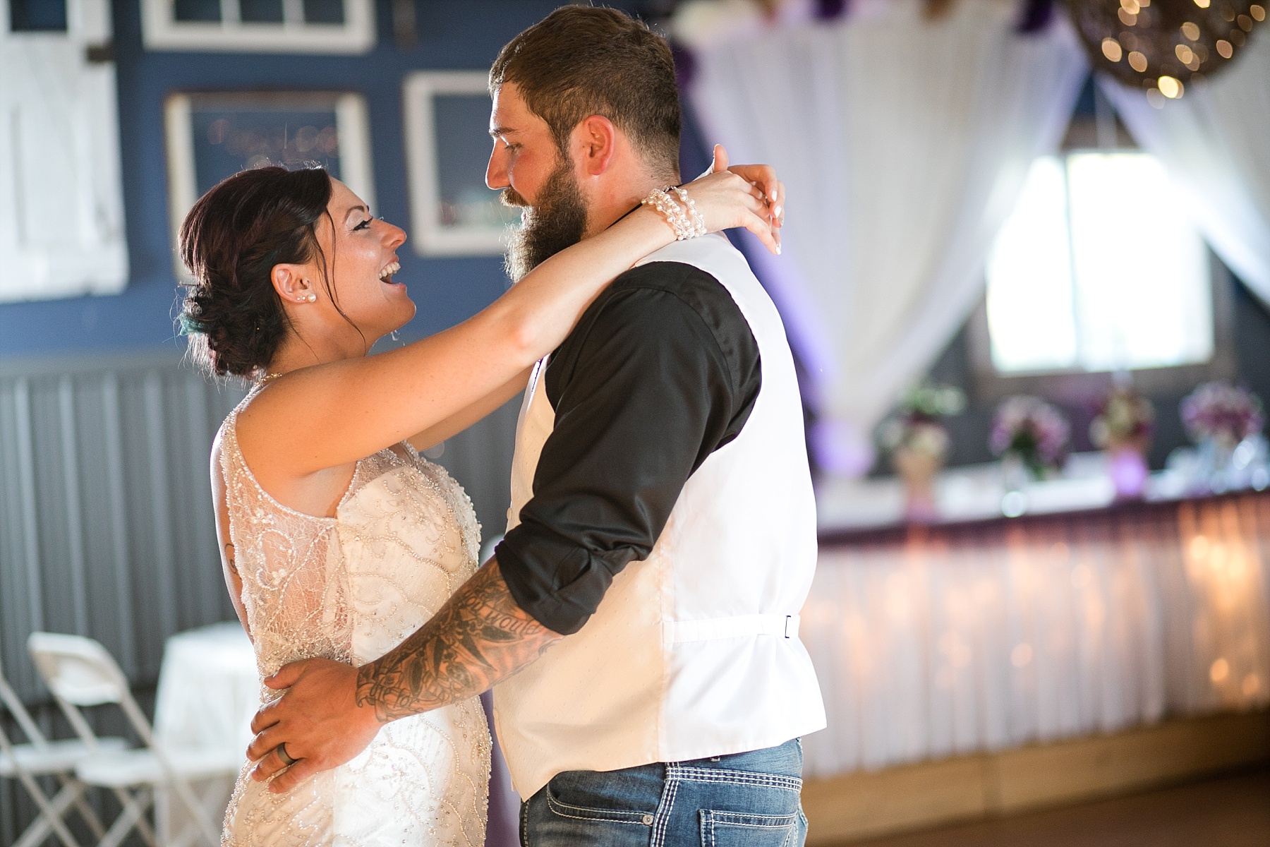 Pulled by a horse-drawn carriage, Cain had tears in his eyes waiting to see Michele walk down the aisle at their Dixon's Apple Orchard wedding in Cadott, WI.