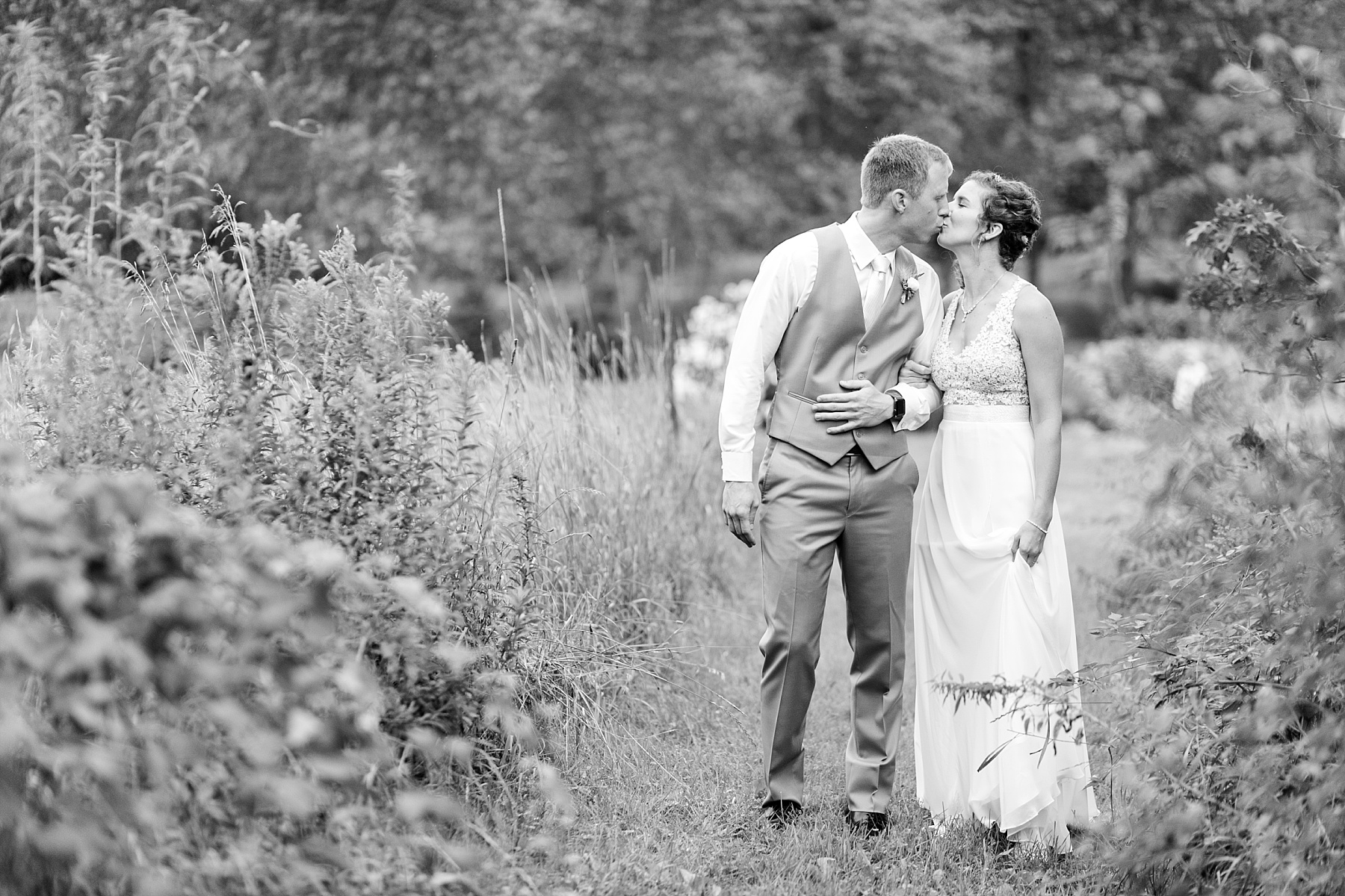 We ran for cover when the rain came, and ran for the fields when the sun peeked out.  Such a romantic wedding at The Enchanted Barn for Susan & Alex.