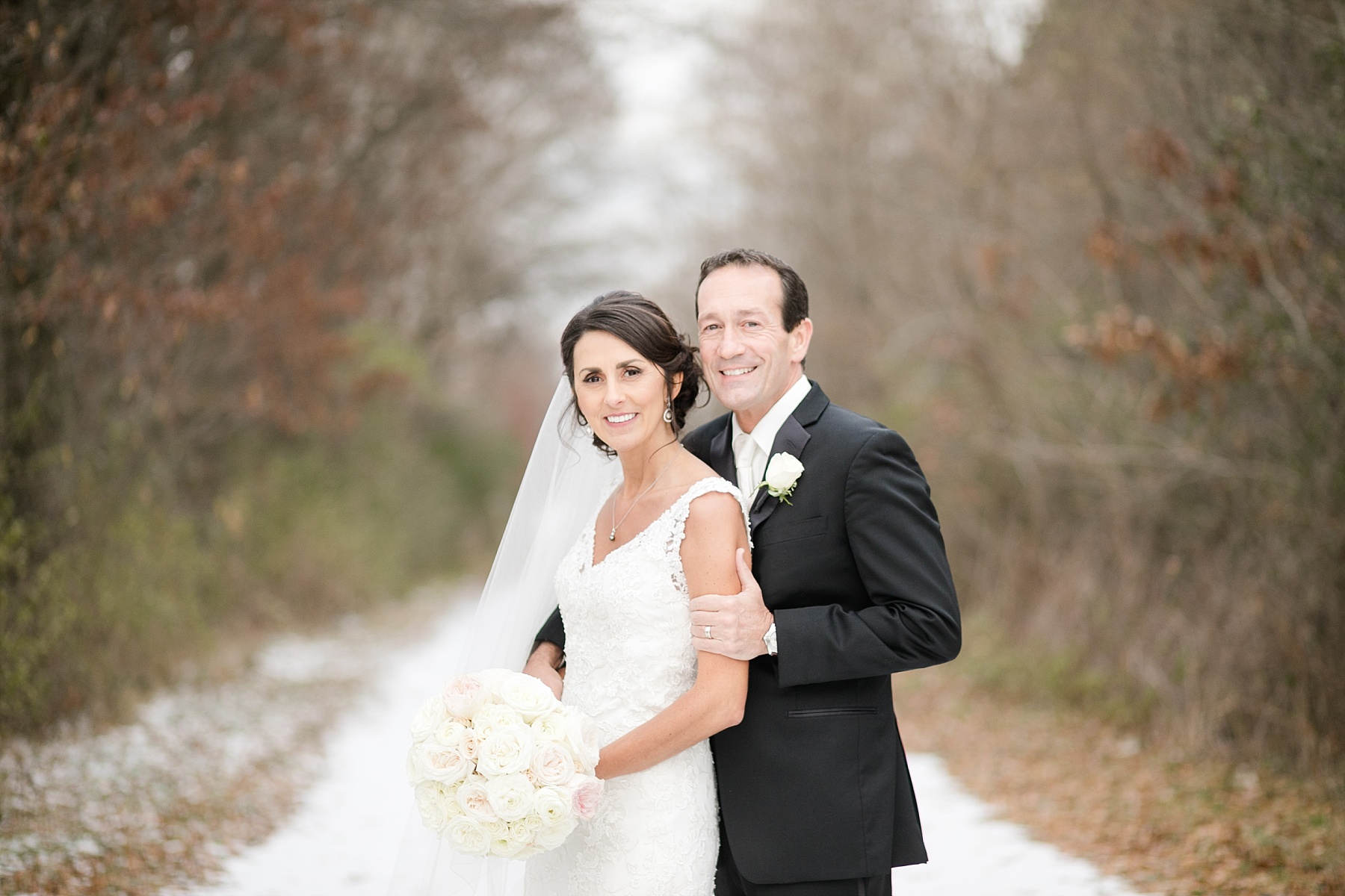 Kelly & Bob woke up to a light dusting of snow for their wedding at The Condensery wedding in Osseo, WI