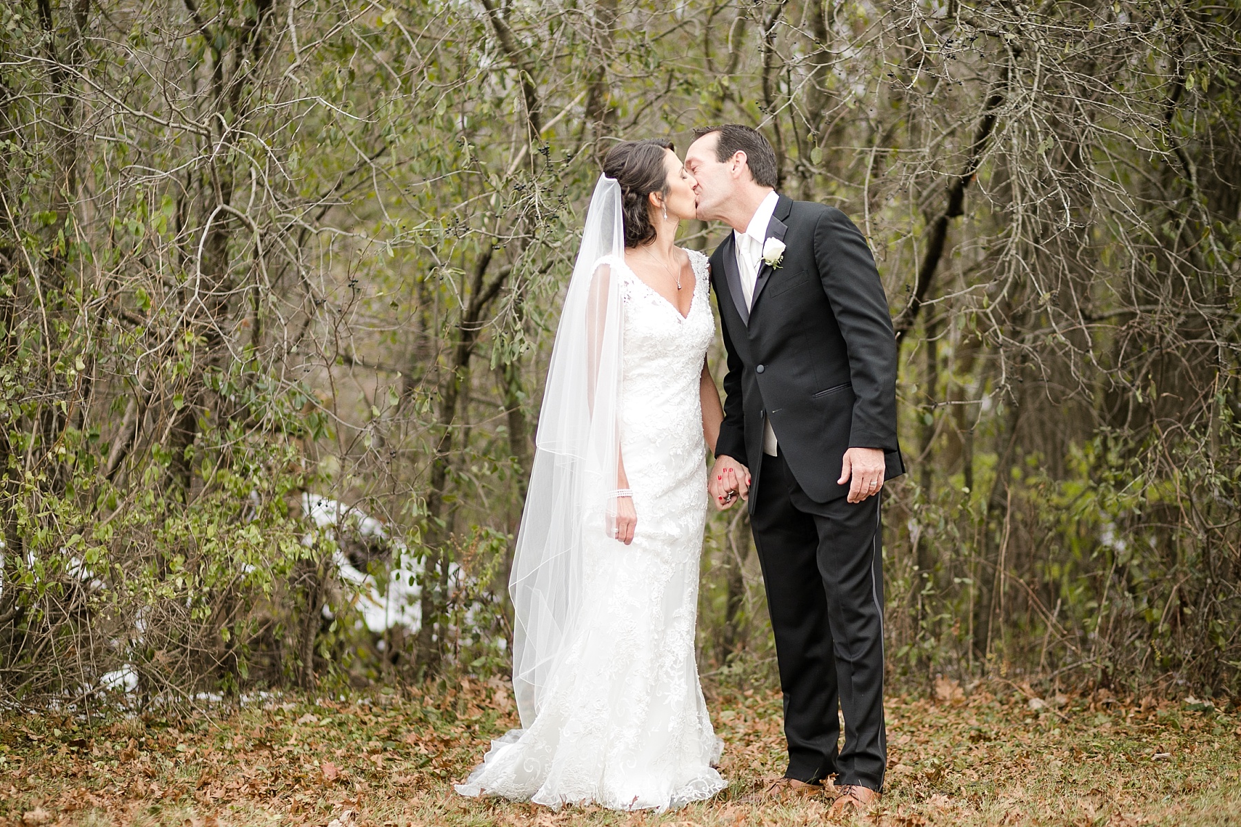 Kelly & Bob woke up to a light dusting of snow for their wedding at The Condensery wedding in Osseo, WI