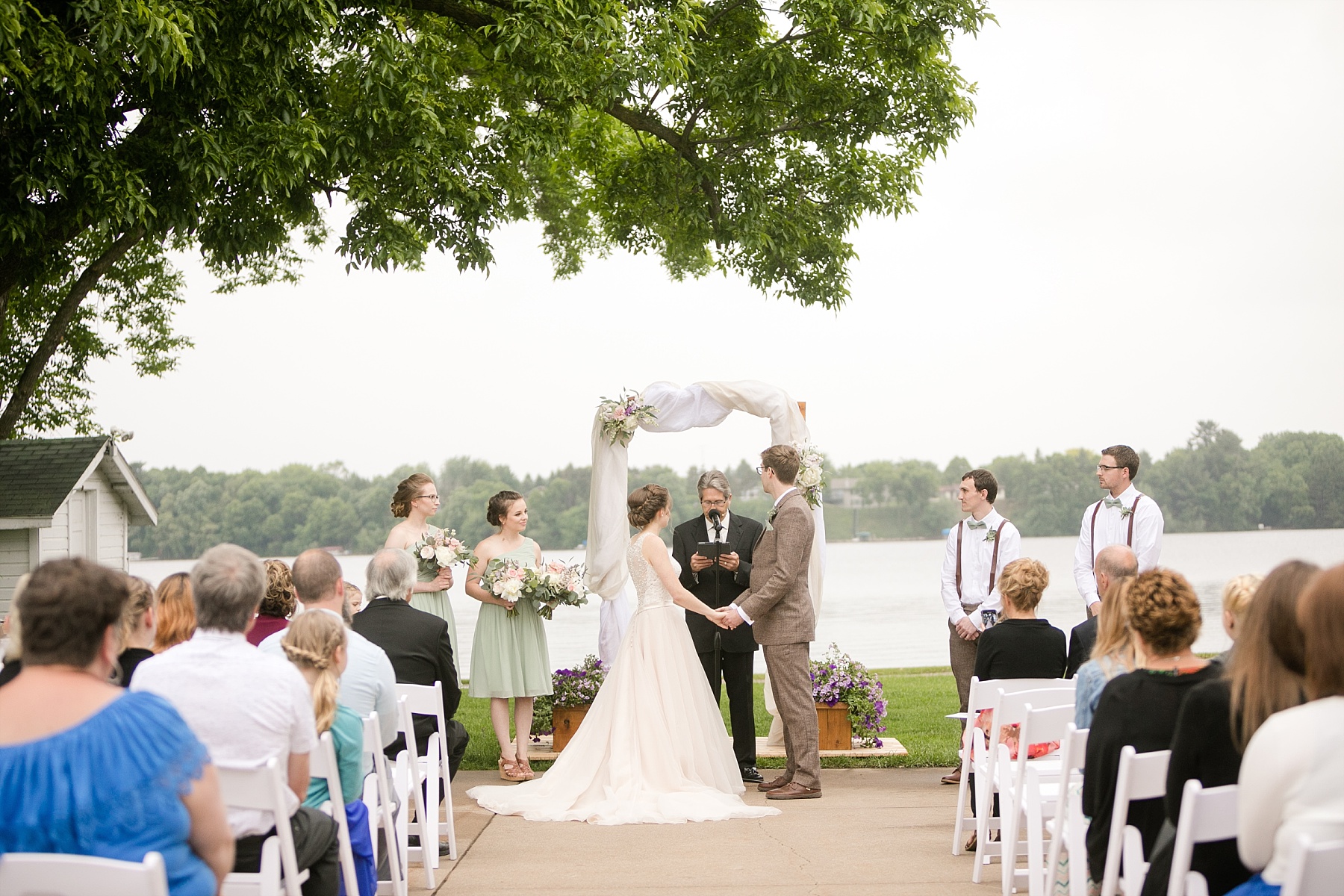 Delicate details and tender moments surrounded Bailey & Jenna for their Lake Wissota Golf wedding.