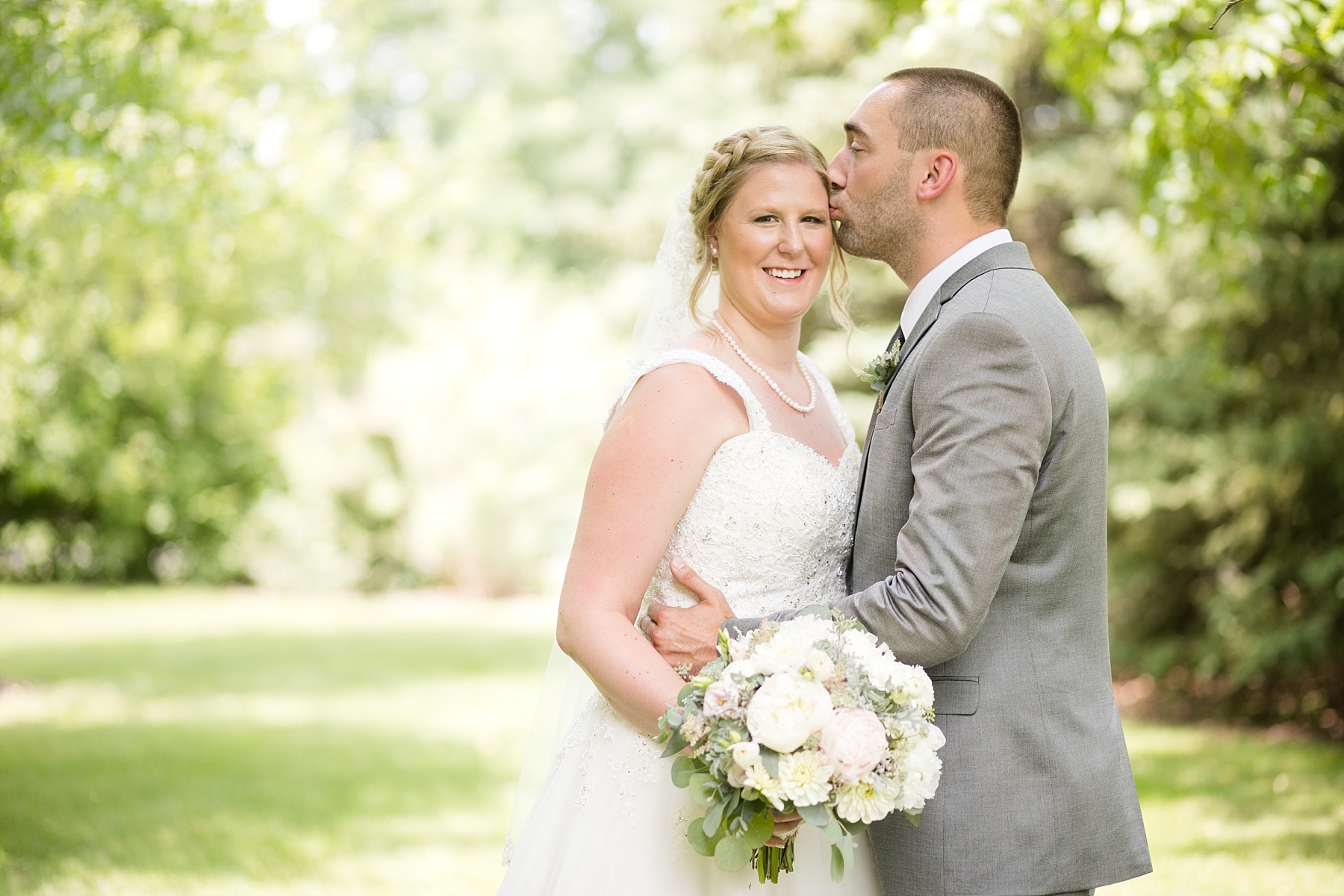 A sweltering Wisconsin wedding on Lake Wissota, Danielle & Anthony were married at White's Wildwood Retreat.