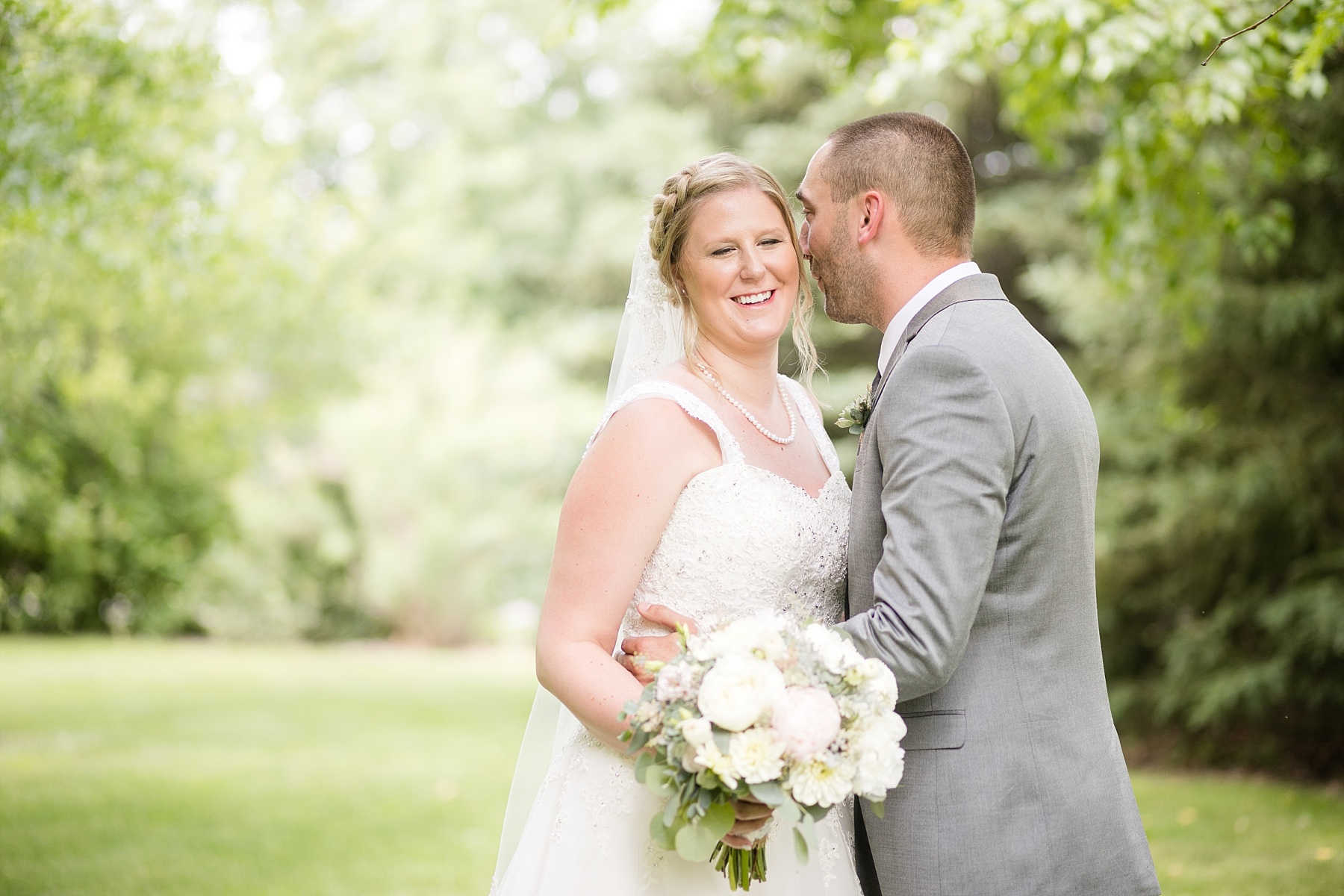 A sweltering Wisconsin wedding on Lake Wissota, Danielle & Anthony were married at White's Wildwood Retreat.