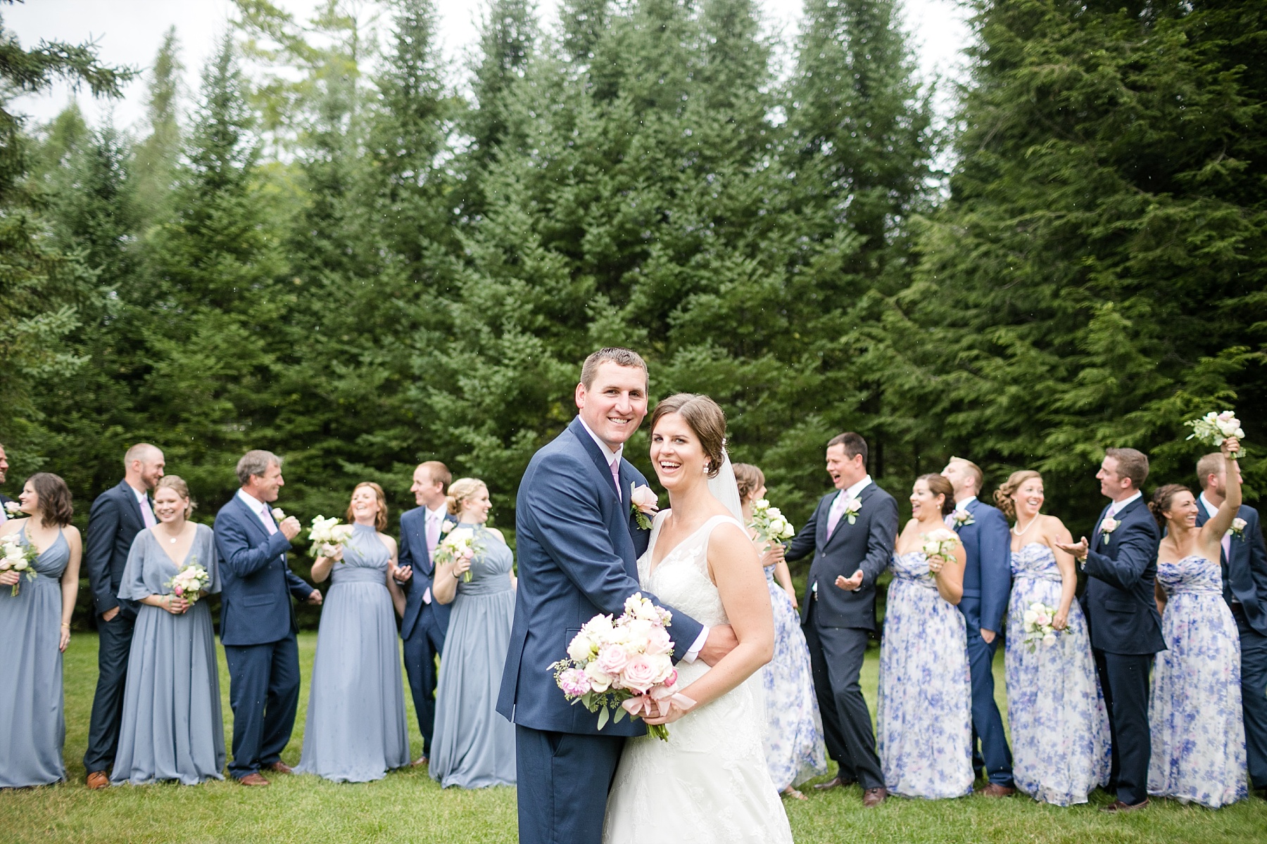 Maureen & Jamie were married on the shores of Little Saint Germain Lake, pouring rain & gale force winds couldn't stop them both from smiling from ear to ear.