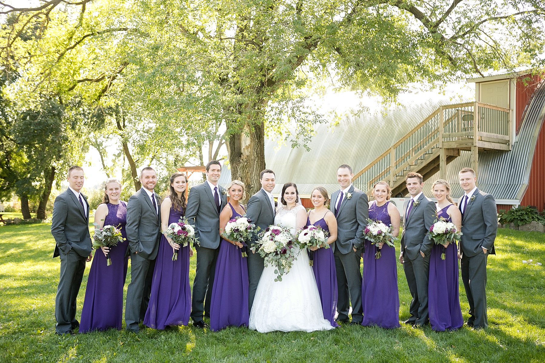 bridal party pictures outside at Celebrations at the Gables in Turtle Lake, WI