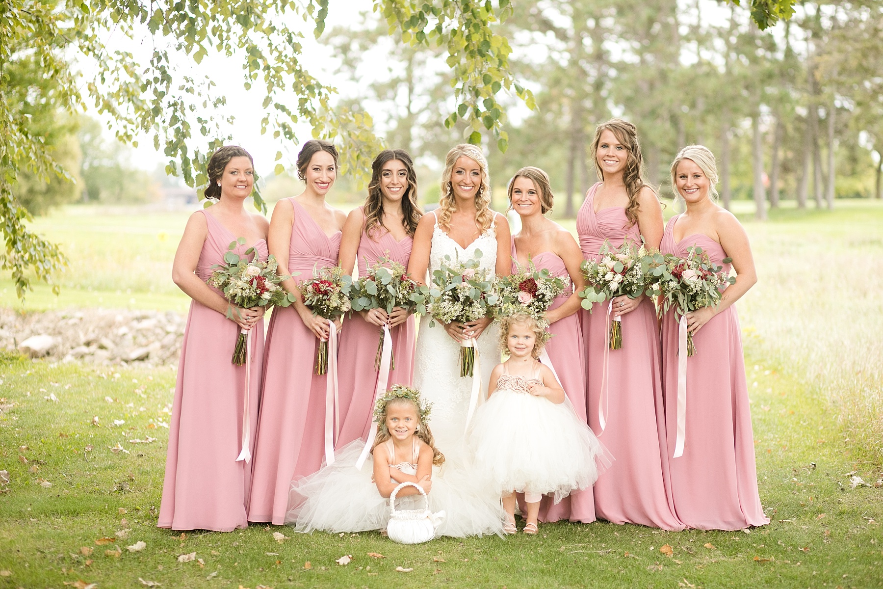 bridesmaids with flowergirls at wedding at Lake Wissota Golf & Events