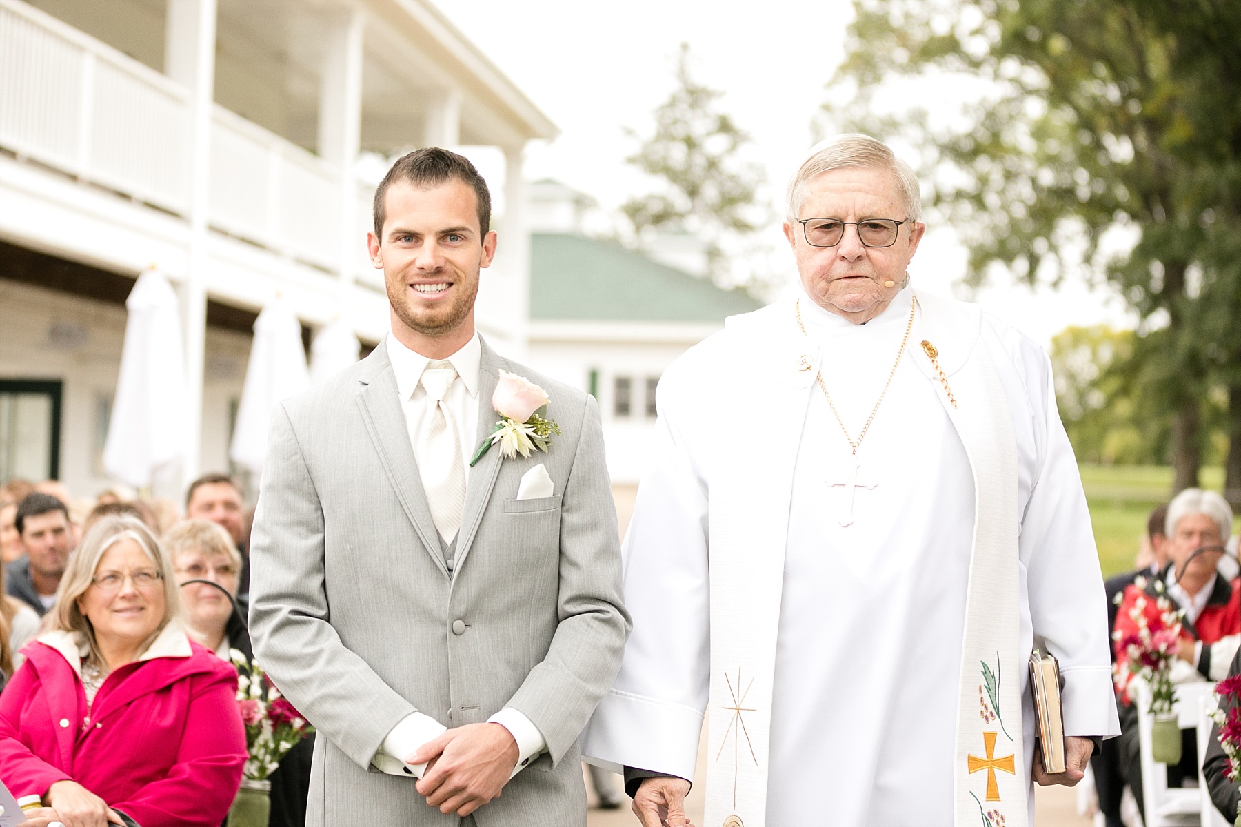 groom and pastor at Lake Wissota Golf & Events