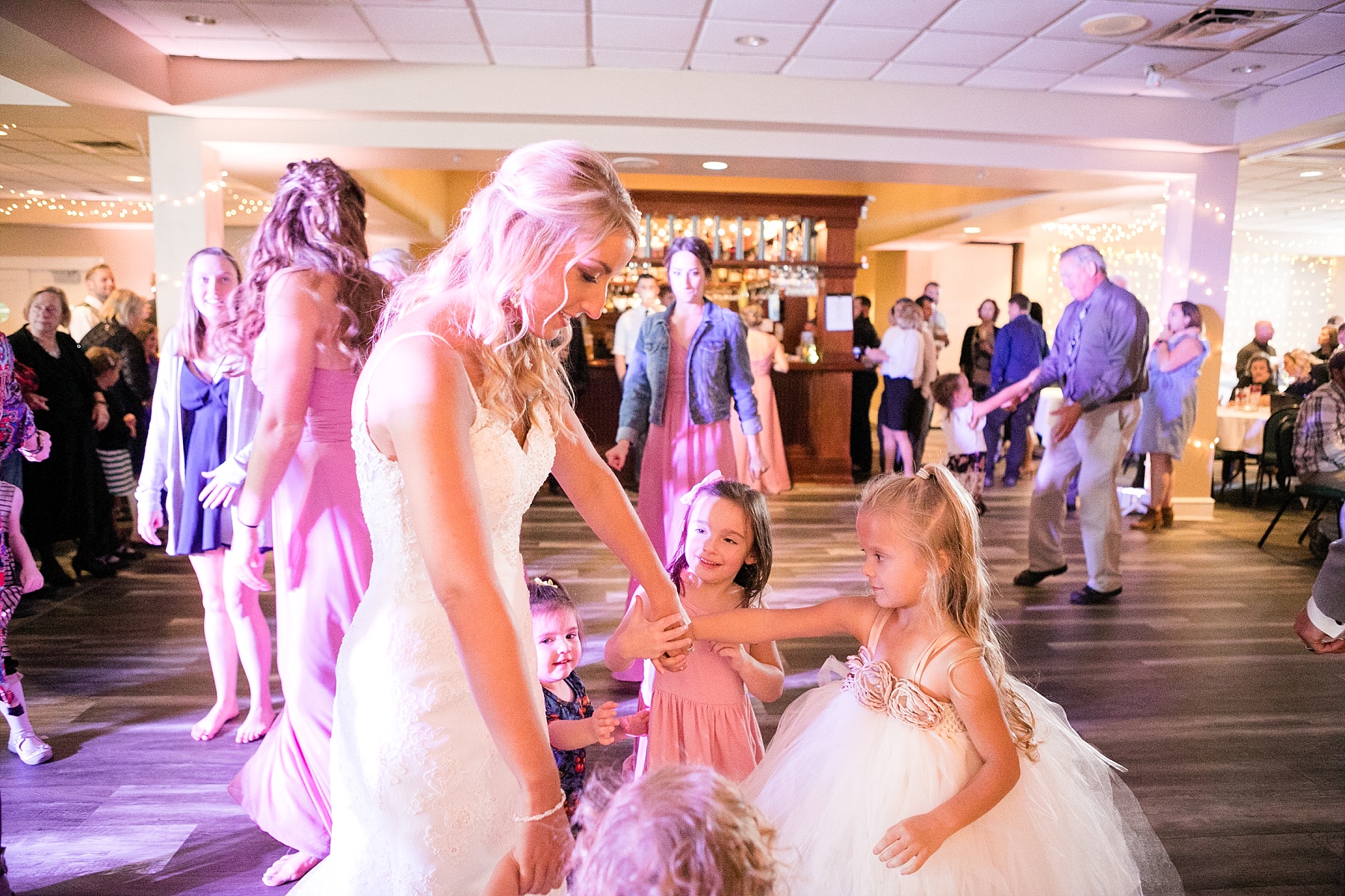 bride dancing with flower girls at Lake Wissota Golf & Events