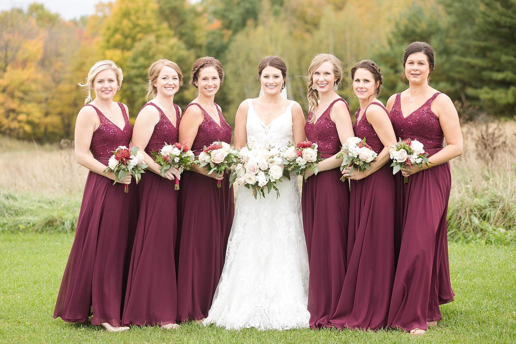 bride and bridesmaids wedding at the barn on stoney hill