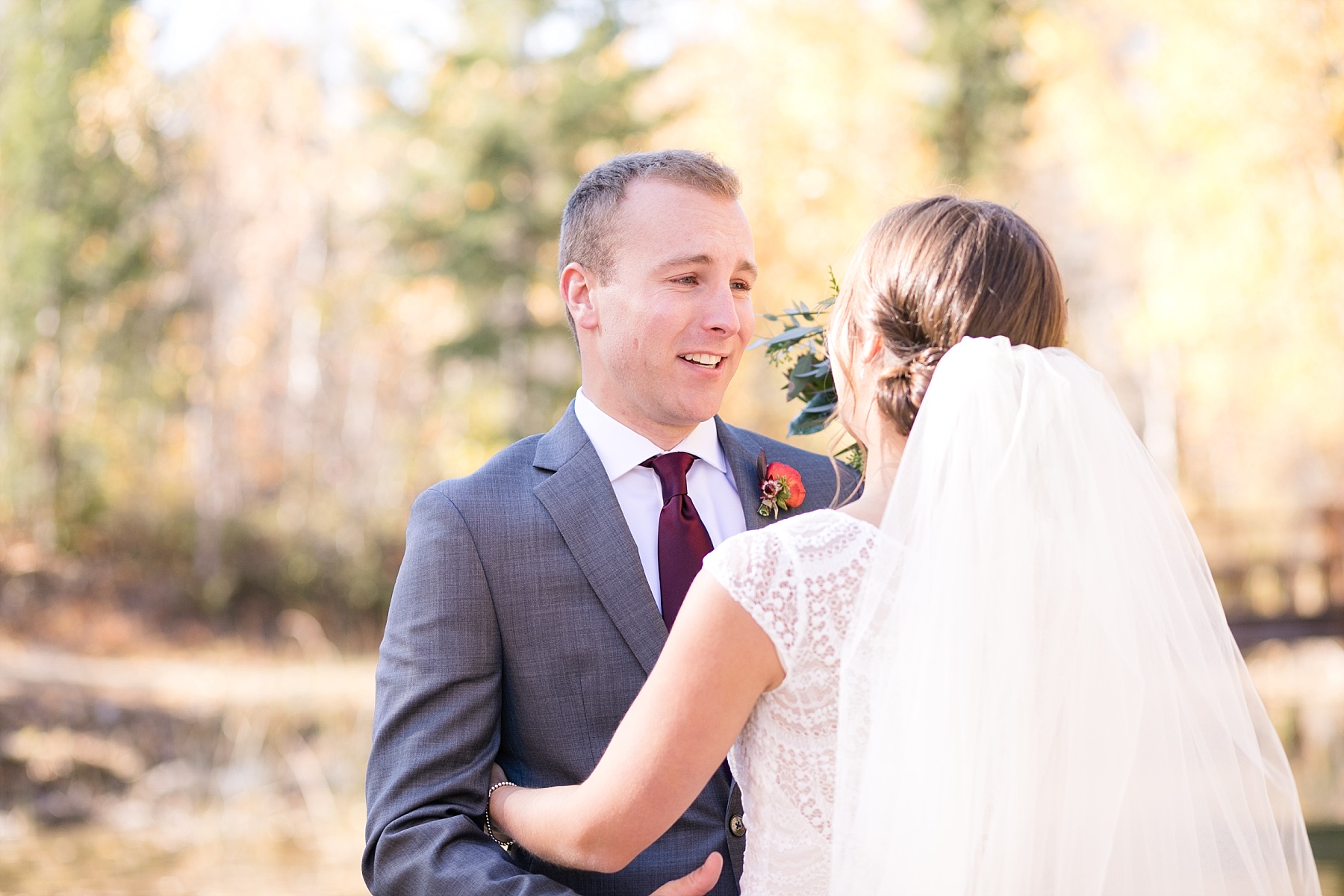 bride and groom first look at Glacier National Park elopement