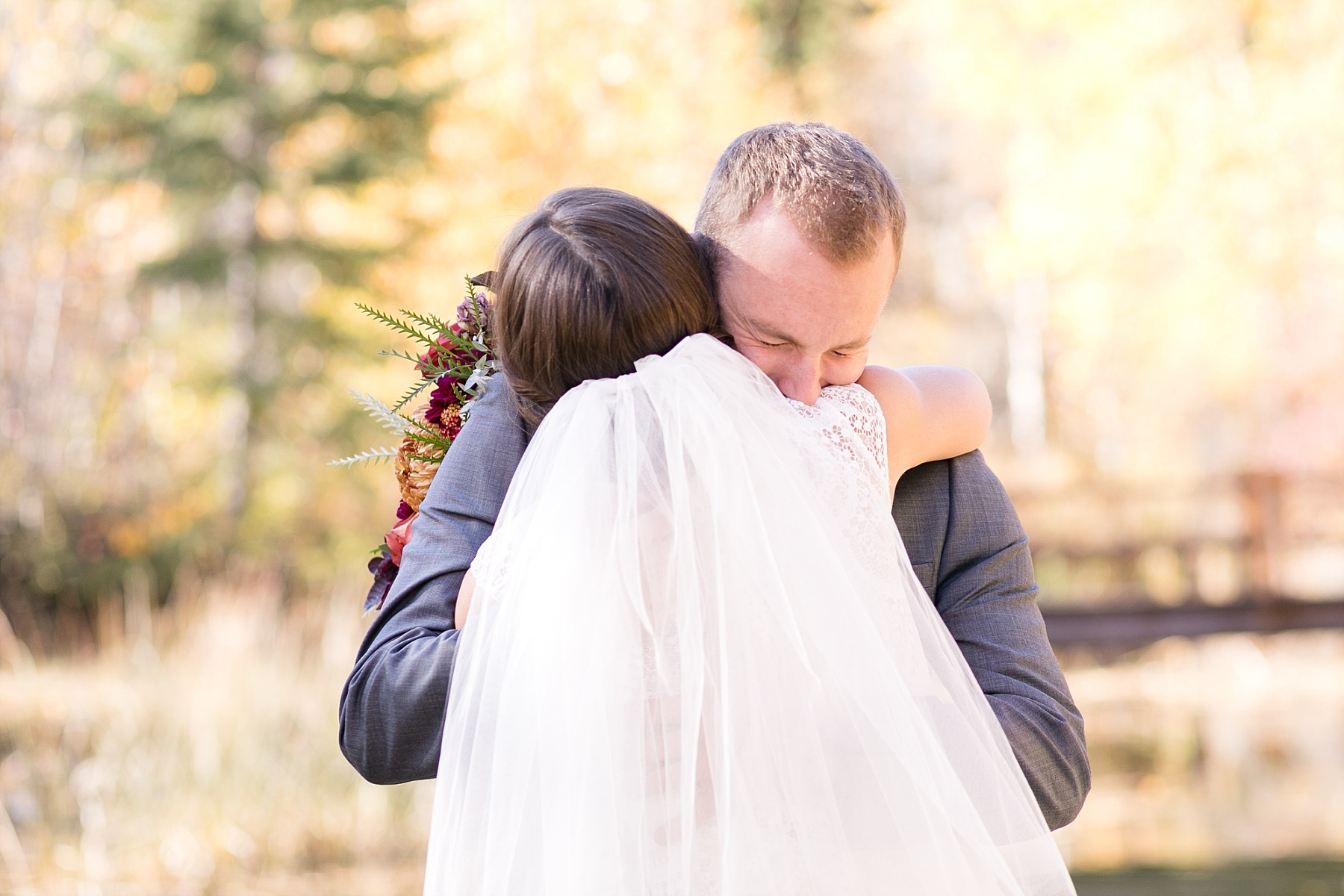 bride and groom first look at Glacier National Park elopement