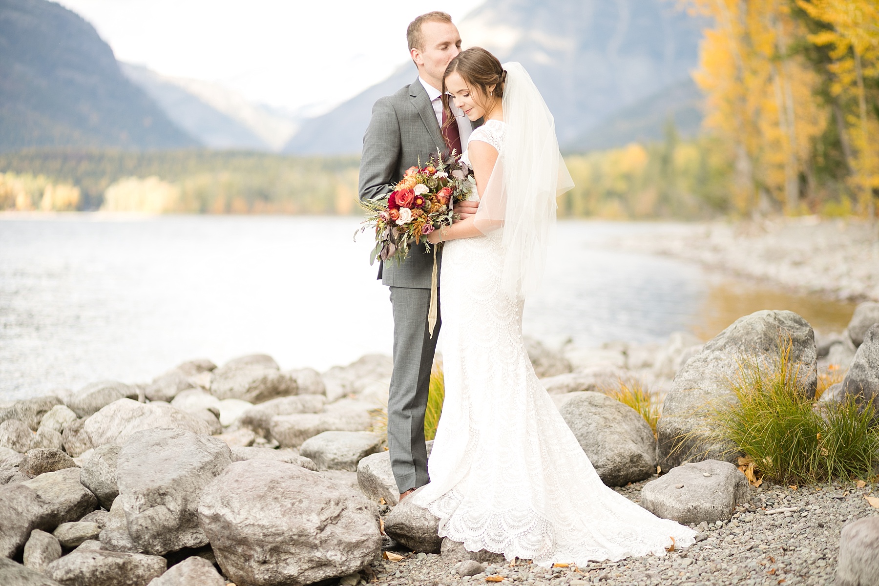Glacier National Park elopement, couple at Lake McDonald lodge