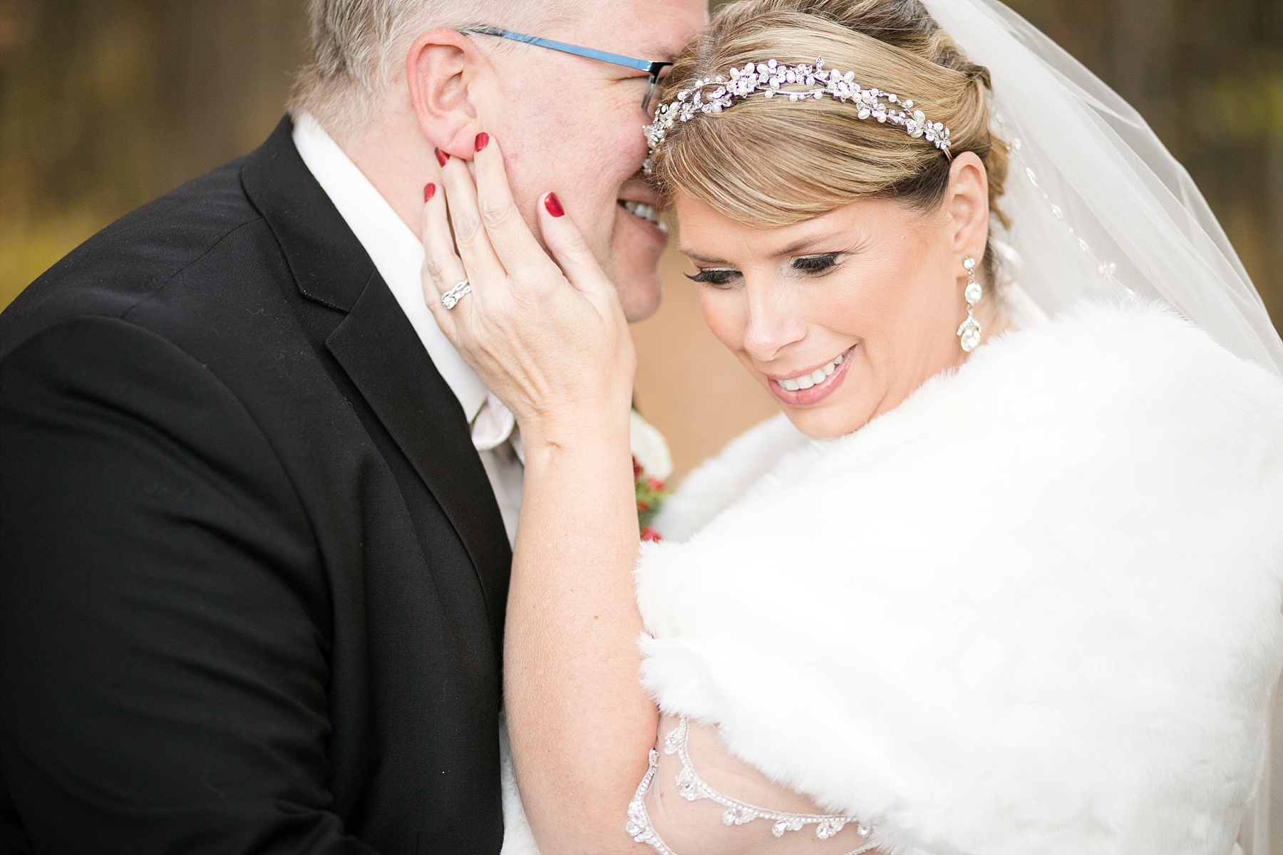 bride and groom up close at winter themed wedding