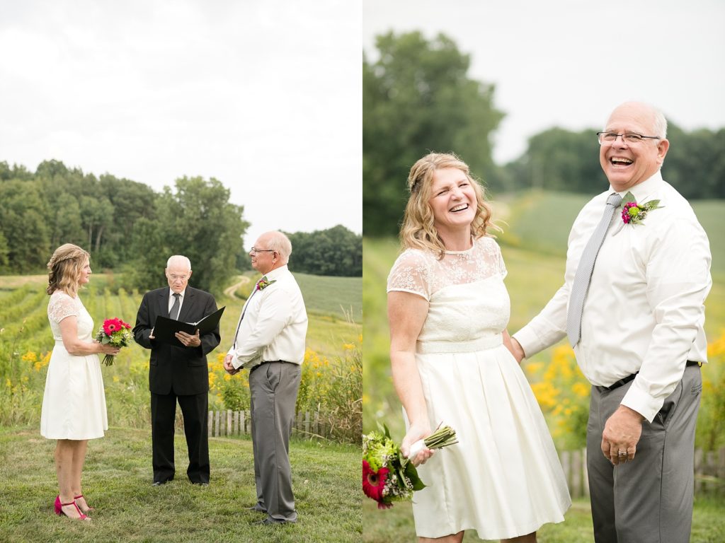 couple during their elopement with their pastor at cottage winery and vinyard.  bride and groom laughing together.