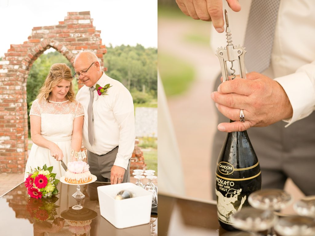 couple cutting their bundt cake after eloping and groom uncorking their wine with a corkscrew
