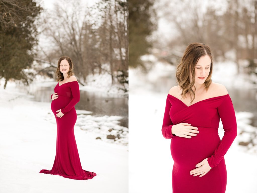 winter maternity photos in Eau Claire near a river in a red dress