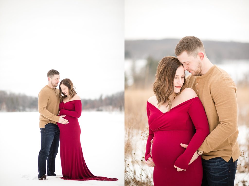 couple on a frozen lake for their maternity photos in a red dress in Eau Claire, Wisconsin