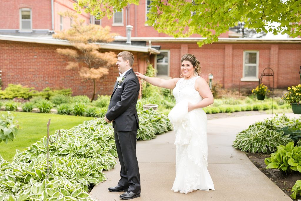 first look outside the cathedral at Wedding at St. Raphael & St. Patrick Cathedral in Dubuque