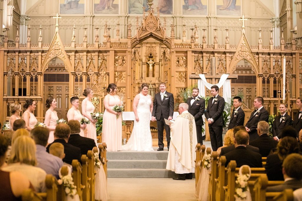 ceremony with bridal party at St. Raphael's Cathedral Wedding in Dubuque
