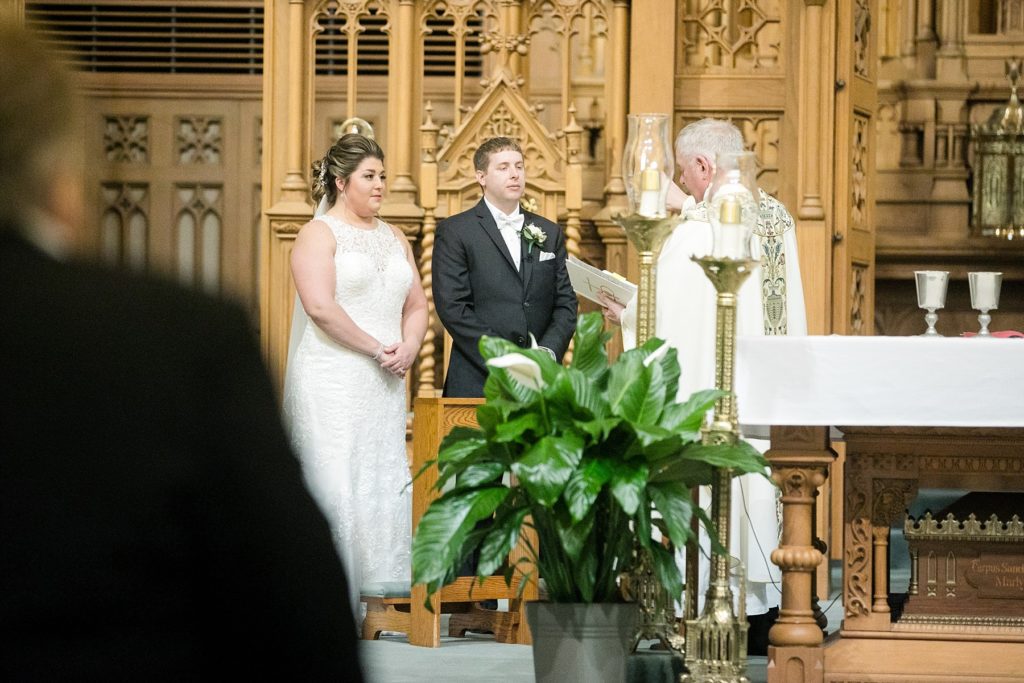 ceremony at at St. Raphael's Cathedral Wedding in Dubuque