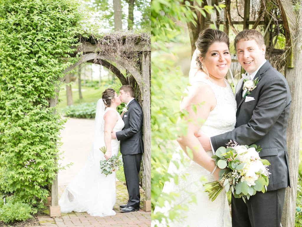 couple under archway with vines at Dubuque Arboretum