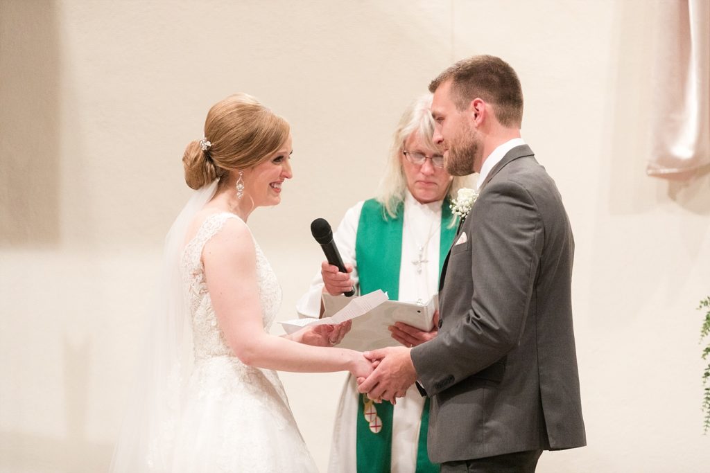couple sharing their vows at Hope Lutheran Church in Eau Claire