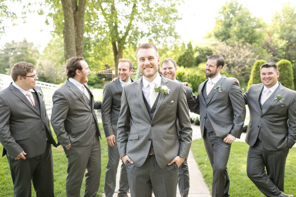 groom with groomsmen at wedding atThe Florian Gardens in Eau Claire