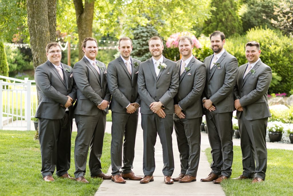groom and groomsmen at wedding atThe Florian Gardens in Eau Claire