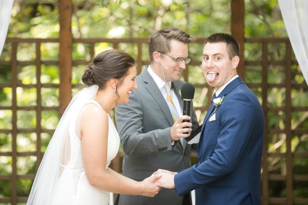 groom flubs up vows and makes a face at the camera