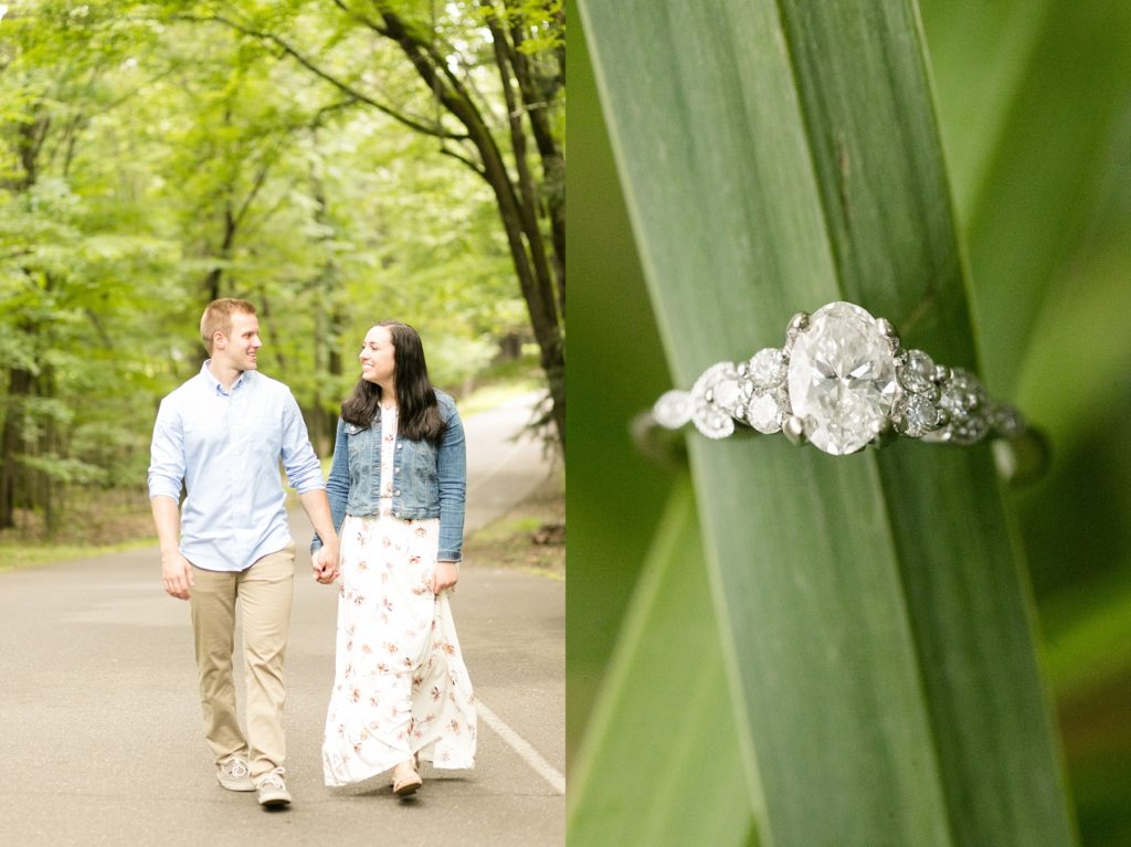 couple walking in Brunet Island State Park for their engagement pictures and the ring on a leaf