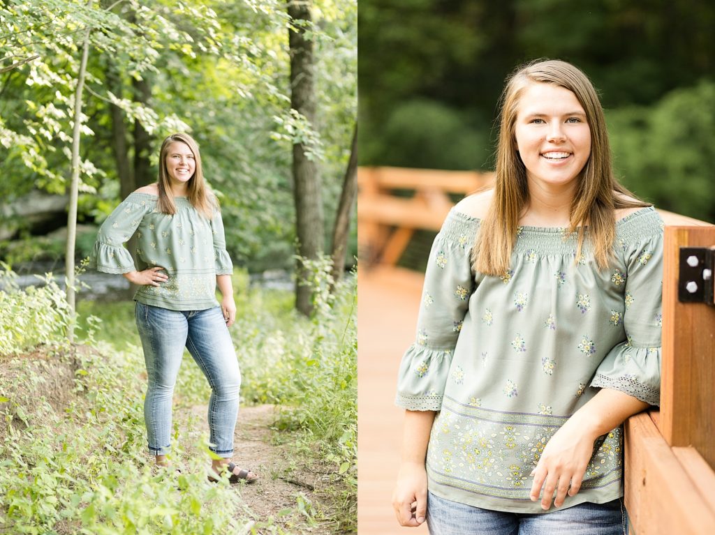 girl in woods and on copper bridge in a green floral top for Chi-hi senior photos