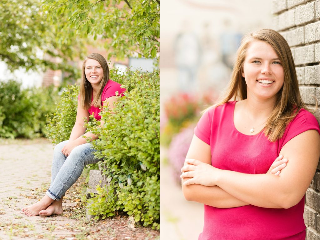 girl sitting in greenery and leaning against brick in a hot pink shirt in Chippewa Falls, WI
