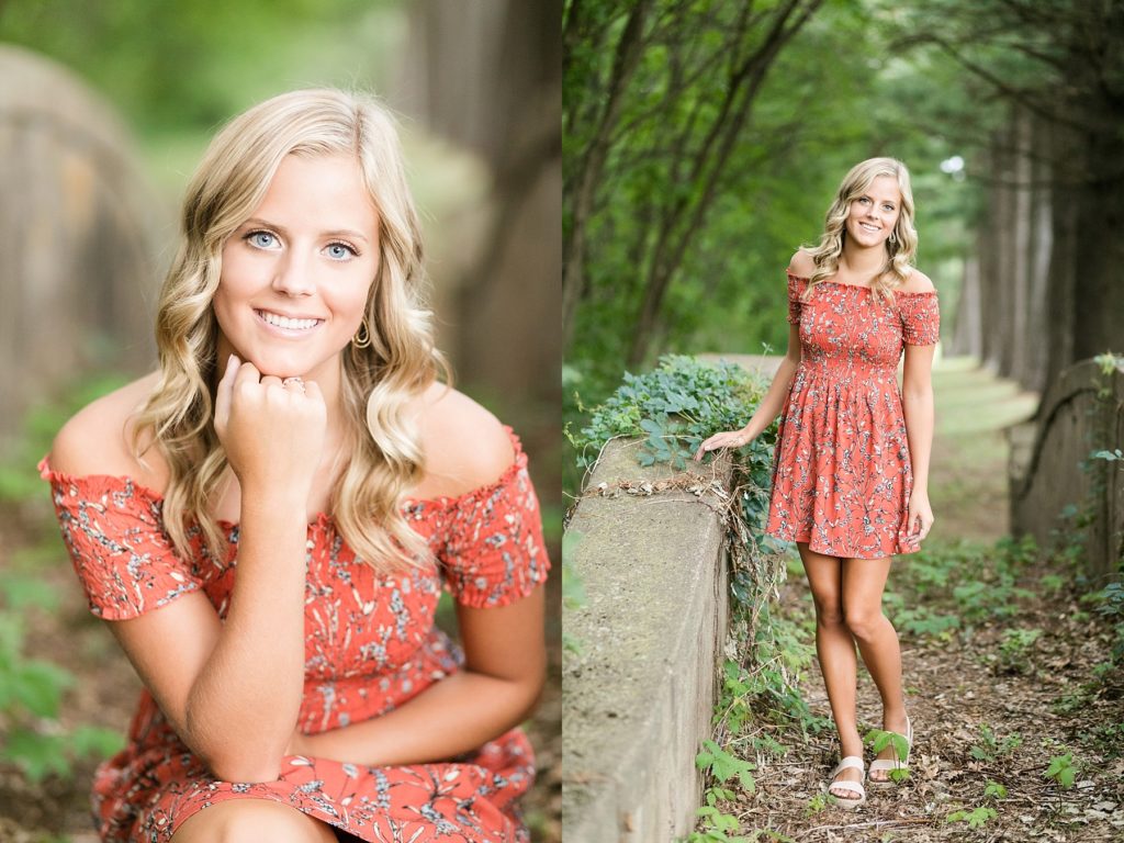 girl on a vine covered concrete bridge that was abandoned in Chippewa Falls for her senior photos