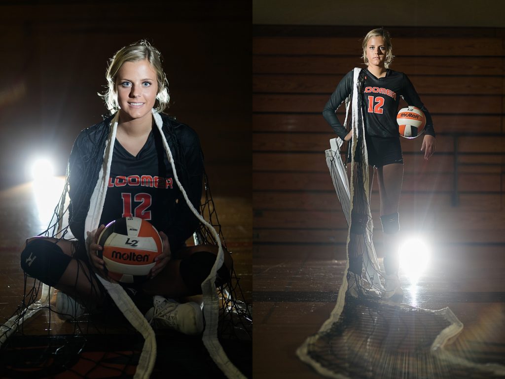girl holding a volleyball with the net draped over her shoulders for sports senior photos in Bloomer WI