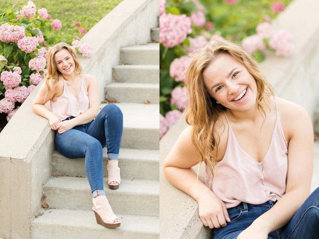pretty pink hydrangeas behind a girl sitting on stairs in Eau Claire WI for sweet 16 photos