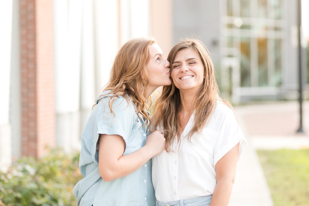 daughter kissing moms cheek at sweet 16 photo session