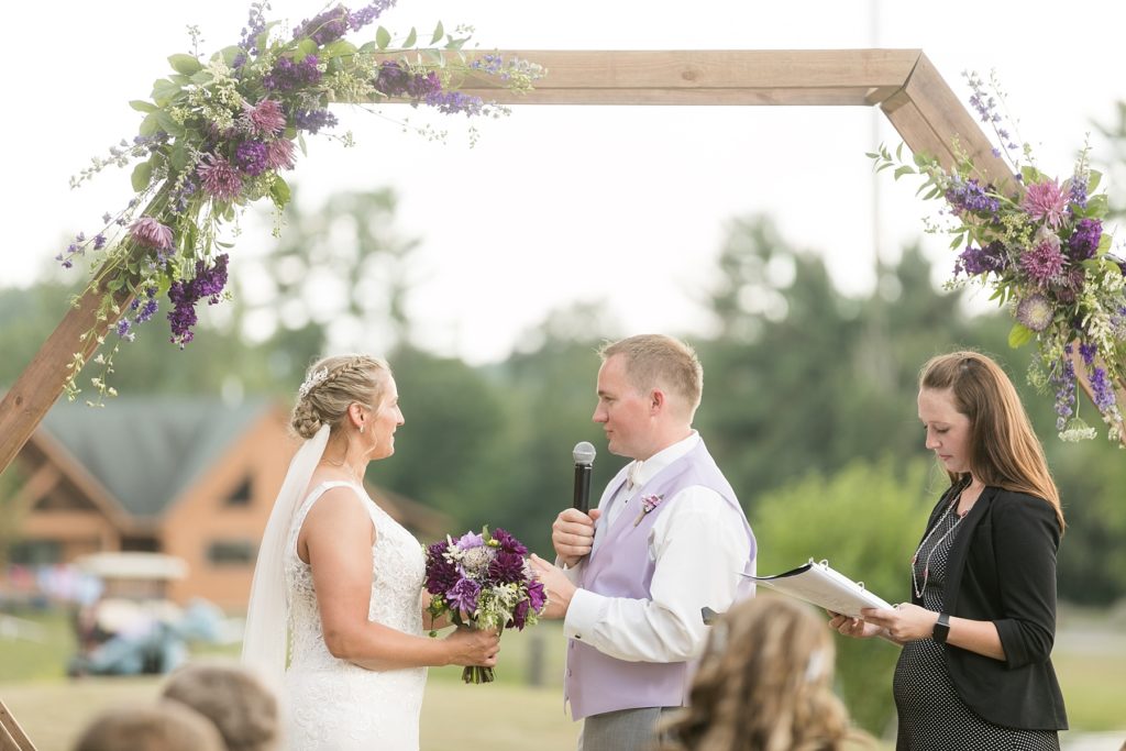 couple reciting their vows for their wedding at Three Bears Resort in Warrens, WI