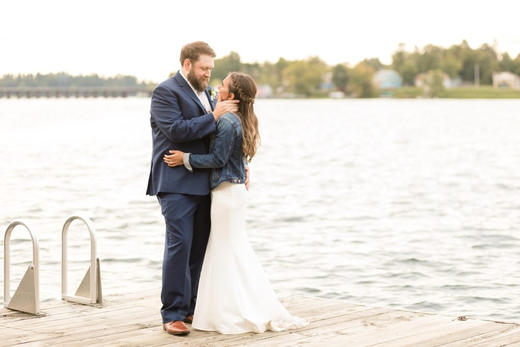 bride and groom on Lake Minocqua on their wedding day