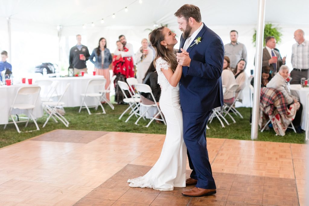 first dance under the tent at The Beacons of Minocqua on their wedding day