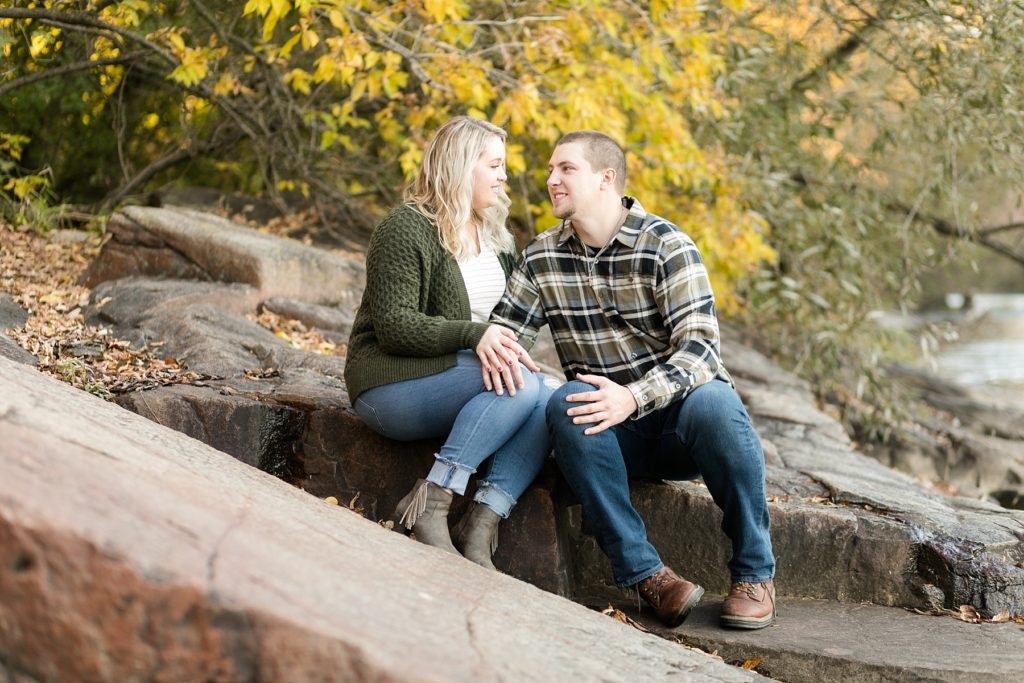couple at Leinenkugels Brewery in Chippewa Falls for their engagement photos on Duncan Creek