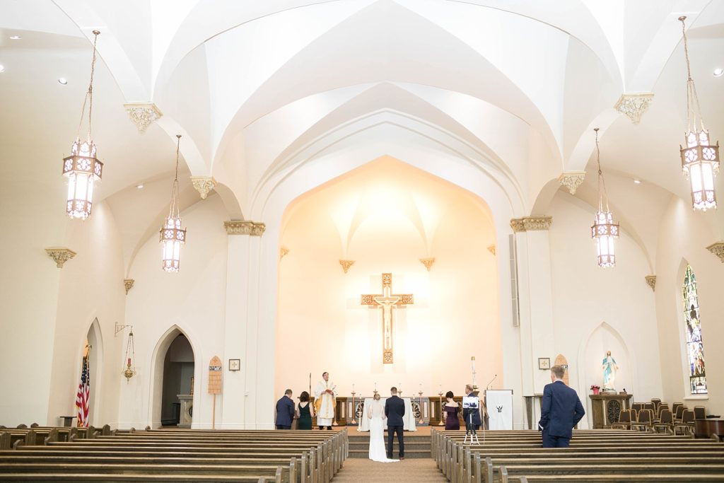 wedding ceremony with eight people at St. Joseph Catholic Church in Rice Lake,. WI