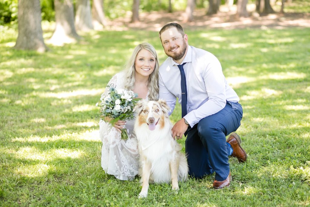 thorp wi micro wedding, couple poses with their dog