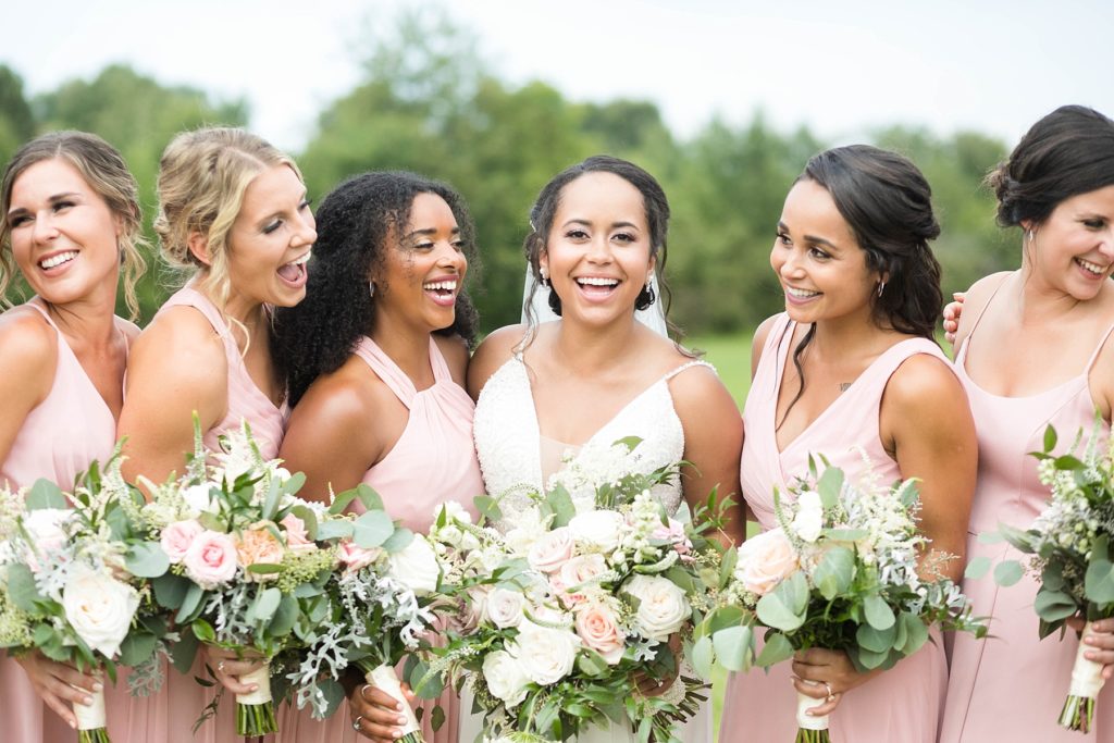bride and bridesmaids laughing at Lilydale in Chippewa Falls, WI