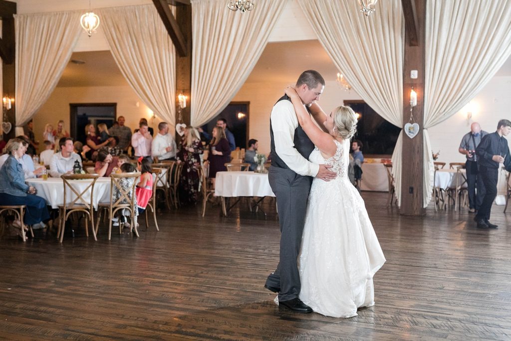 couple shares their first dance at their fall wedding at Lilydale in Chippewa Falls